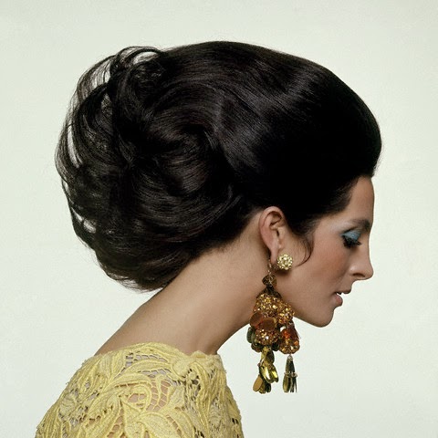 ca. February 15, 1967, New York City, New York, USA --- Yellow lace dress by Gustave Tassell; earrings by Robert Originals. --- Image by © Condé Nast Archive/Corbis